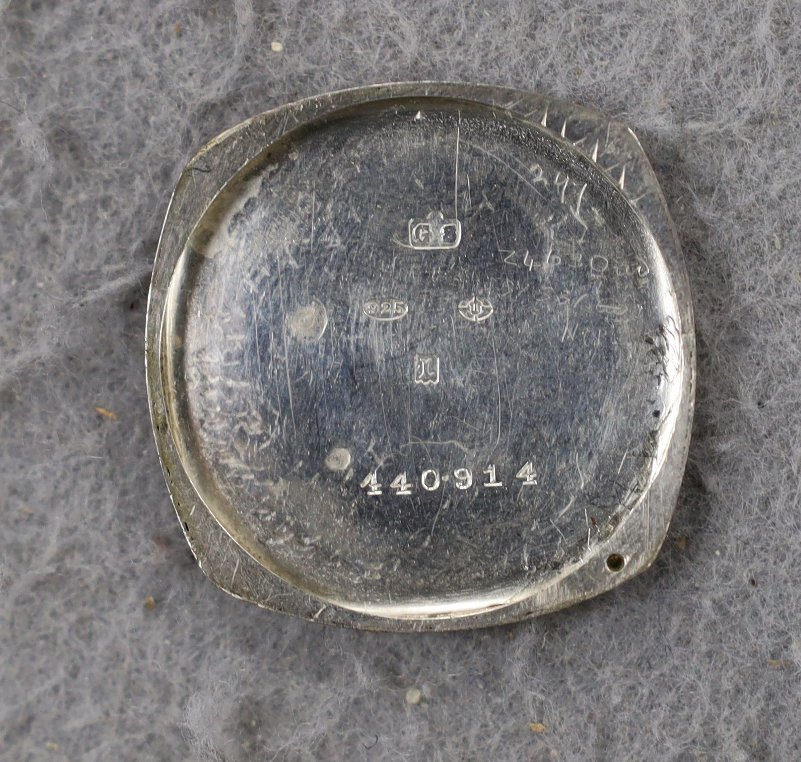 A gentleman's 1920's silver wrist watch, with Arabic dial and subsidiary seconds, the dial signed Rolex, movement unsigned, lacking winding crown.